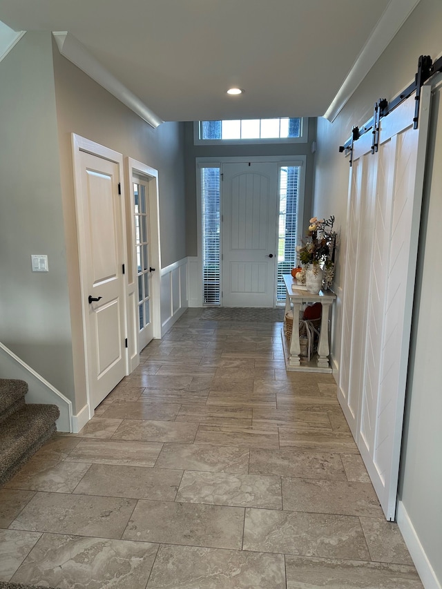 foyer with a barn door