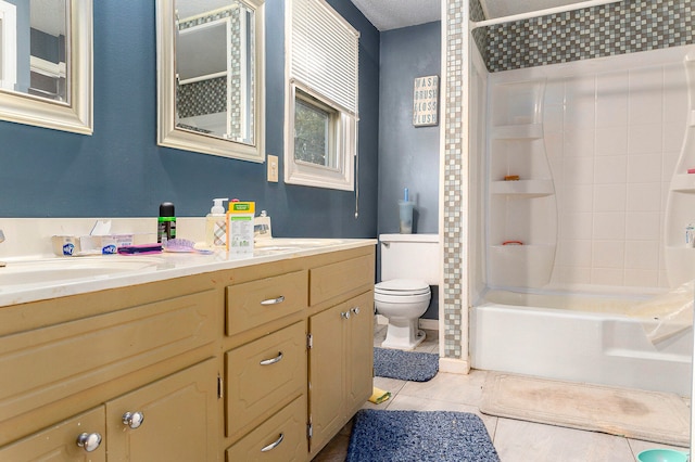 full bathroom with tile patterned floors, vanity,  shower combination, and toilet