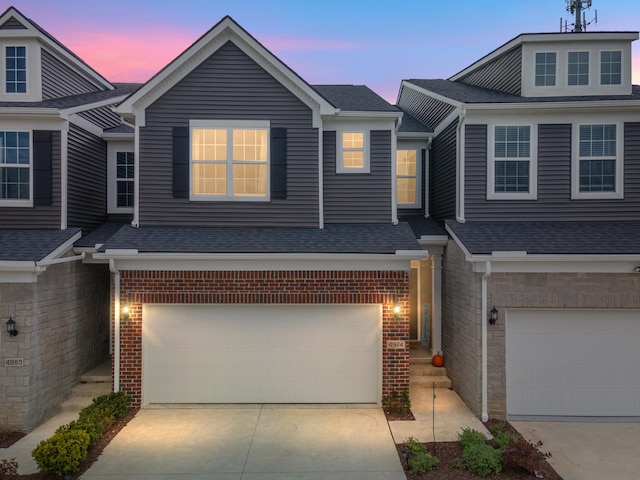 view of front of property with a garage