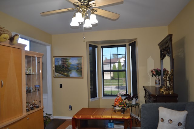 interior space with hardwood / wood-style flooring and ceiling fan