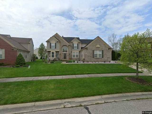 view of front of house with a front lawn