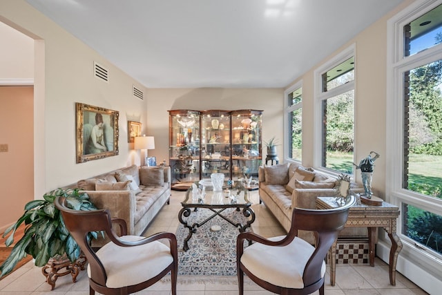 living room featuring light tile patterned floors