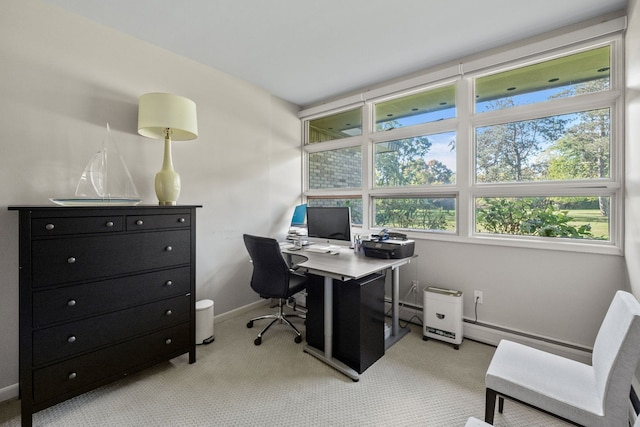 carpeted home office with baseboard heating