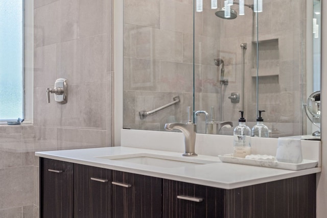 bathroom featuring vanity and walk in shower