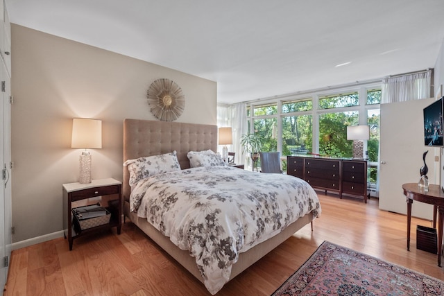 bedroom featuring light wood-type flooring