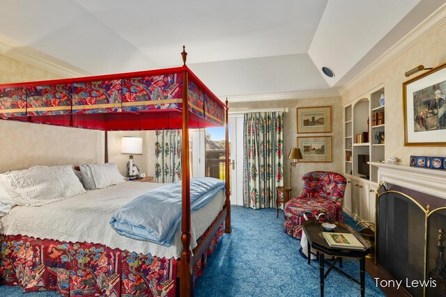 610 Cascade Hills Holw SE, Grand Rapids, MI 49546 - carpeted bedroom featuring lofted ceiling, access to outside, a fireplace, and ornamental molding
