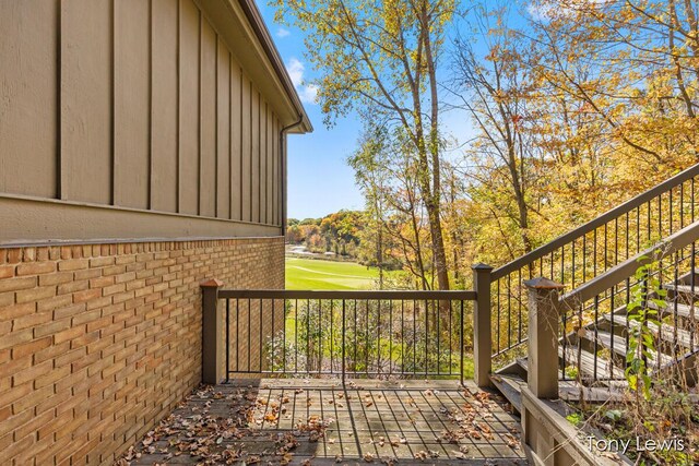 610 Cascade Hills Holw SE, Grand Rapids, MI 49546 - deck with stairway and view of golf course