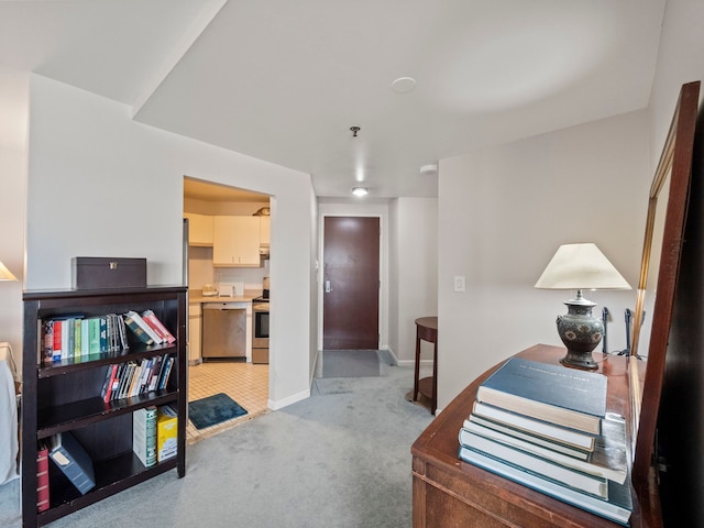 office area featuring light colored carpet