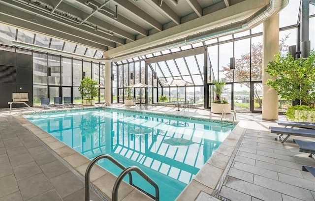 view of swimming pool featuring a patio area