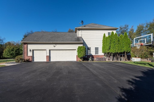 exterior space with a garage