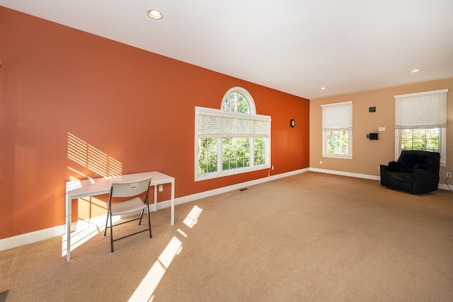 living room featuring light colored carpet