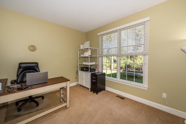 view of carpeted office space