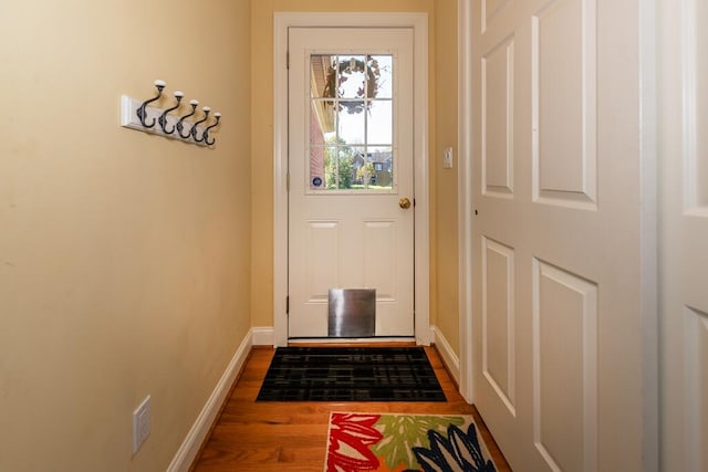 doorway featuring wood-type flooring