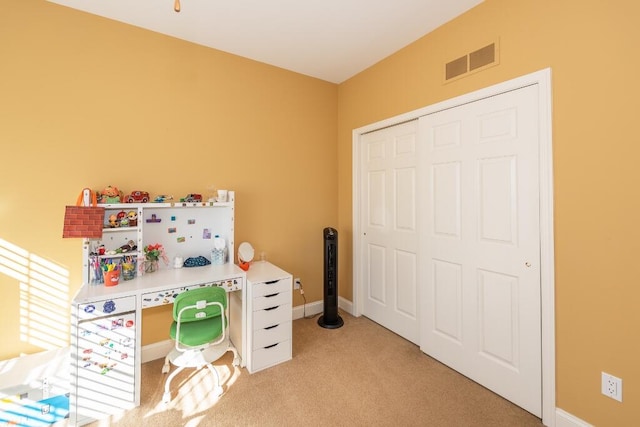 recreation room with light carpet