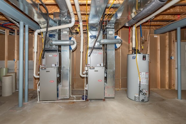 utility room featuring heating unit and water heater