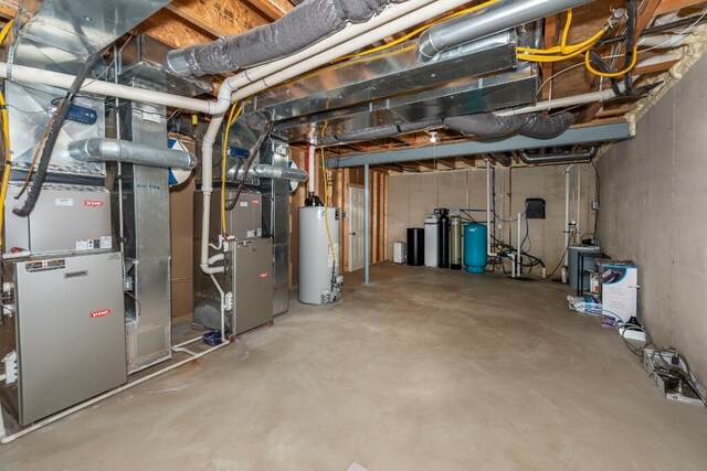 basement with gas water heater and heating unit