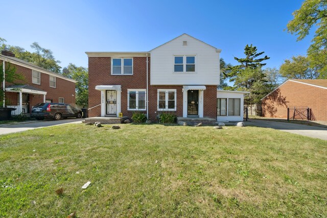 19789-19791 Meyers Rd, Detroit, MI 48235 - view of front of property with brick siding and a front yard