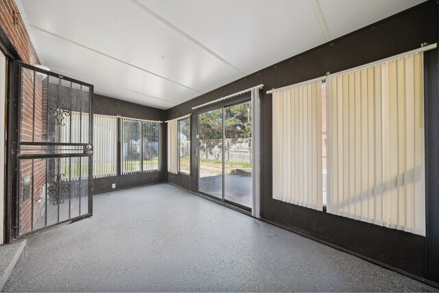 19789-19791 Meyers Rd, Detroit, MI 48235 - unfurnished sunroom with vaulted ceiling