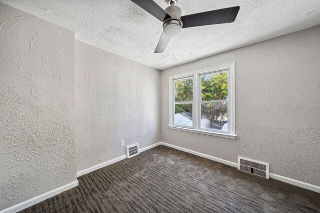 19789-19791 Meyers Rd, Detroit, MI 48235 - carpeted spare room with a textured wall, a textured ceiling, a ceiling fan, and baseboards