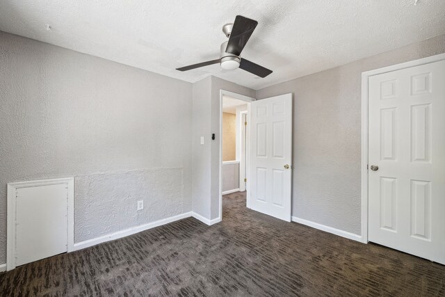 19789-19791 Meyers Rd, Detroit, MI 48235 - unfurnished bedroom with a textured wall, baseboards, a ceiling fan, and carpet floors
