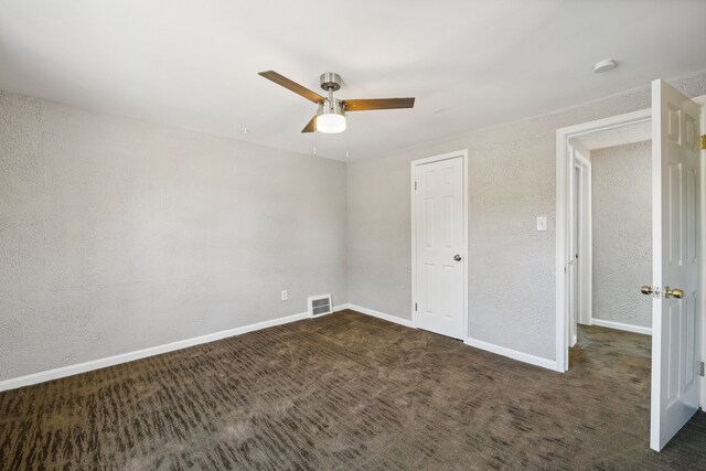 19789-19791 Meyers Rd, Detroit, MI 48235 - unfurnished bedroom featuring a textured wall, carpet flooring, ceiling fan, and baseboards