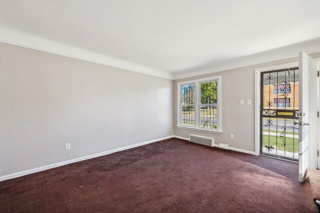19789-19791 Meyers Rd, Detroit, MI 48235 - unfurnished room with baseboards and dark carpet