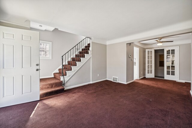 19789-19791 Meyers Rd, Detroit, MI 48235 - foyer featuring carpet flooring, stairway, and baseboards