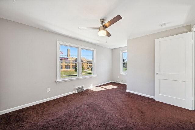 19789-19791 Meyers Rd, Detroit, MI 48235 - unfurnished bedroom with carpet floors, baseboards, and ceiling fan