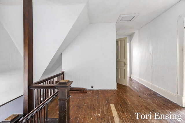 421 Lewis St, Belding, MI 48809 - bonus room featuring hardwood / wood-style floors, attic access, lofted ceiling, and baseboards