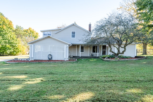 view of property featuring a front lawn