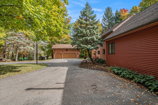 view of home's exterior featuring a garage