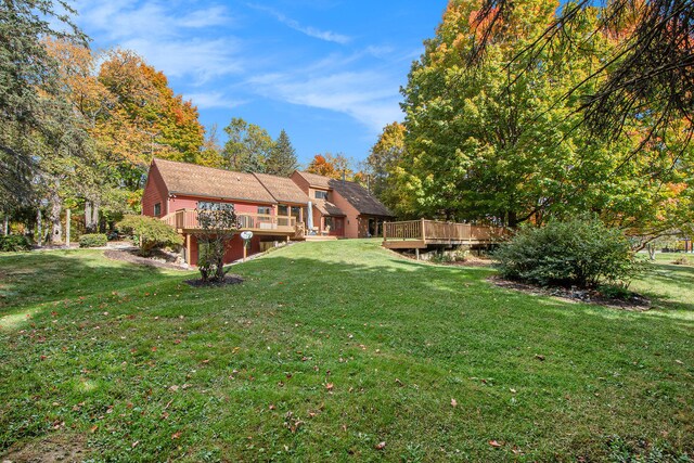 view of yard featuring a deck