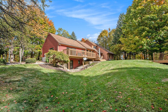 view of yard with a wooden deck