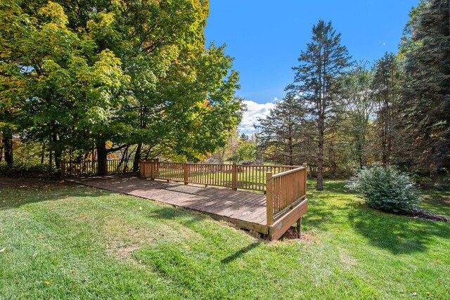 view of yard with a wooden deck