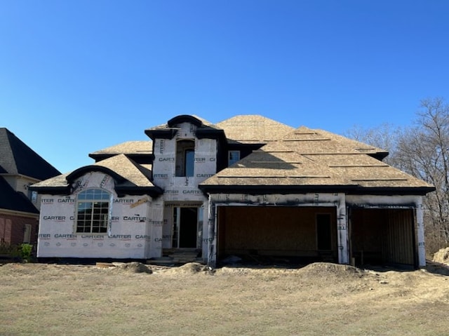 view of front of property featuring a garage