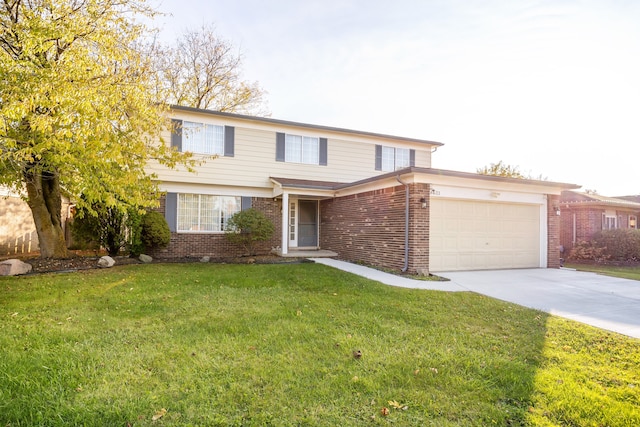 view of property featuring a front lawn and a garage