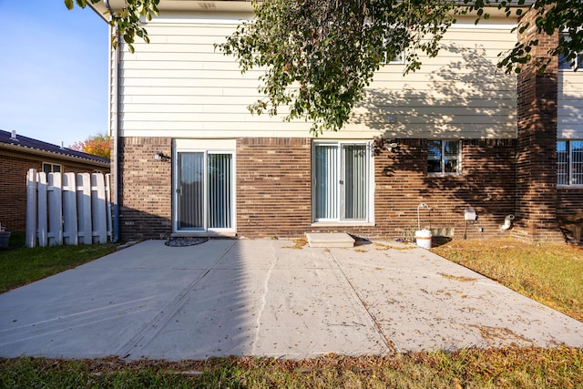 rear view of property with a patio