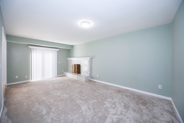 unfurnished living room with carpet floors