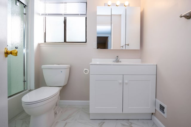 full bathroom with vanity, enclosed tub / shower combo, and toilet