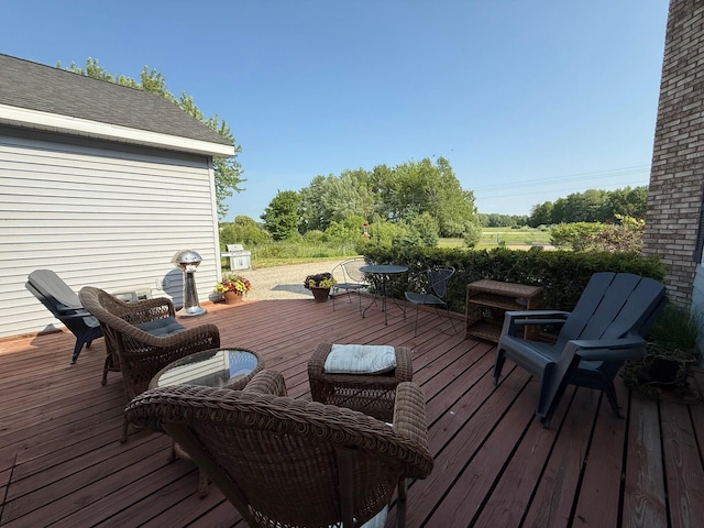 2702 E Hoague Rd, Michigan, MI 49411 - wooden terrace with a grill