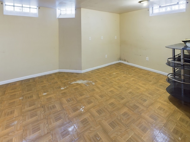 basement featuring light parquet floors