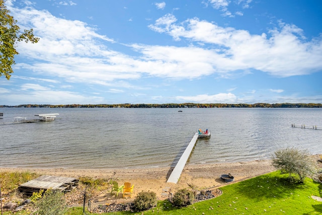 view of water feature with a dock