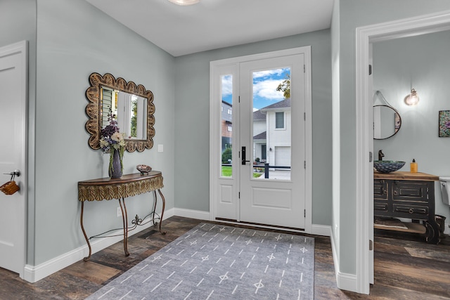 entryway featuring dark wood-type flooring