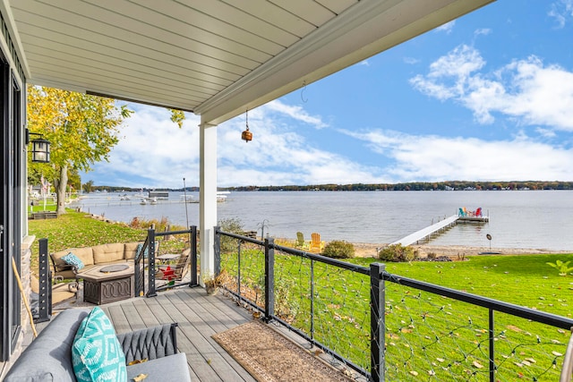 deck featuring a water view