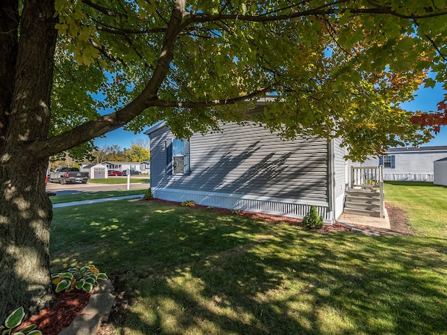 view of property exterior featuring a yard