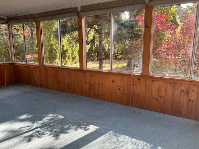 unfurnished sunroom with a healthy amount of sunlight