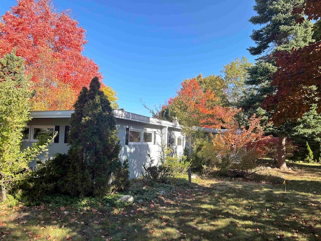 exterior space with a front lawn