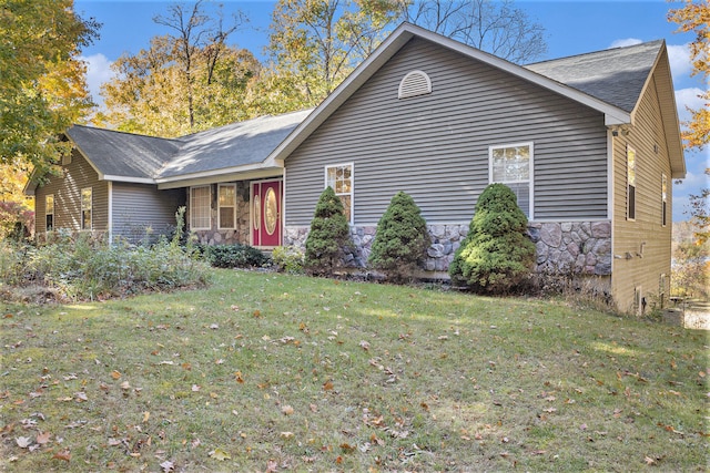 view of property exterior featuring a lawn