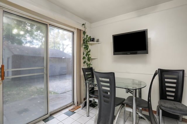 dining area with light tile patterned floors