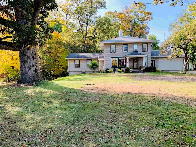 view of front of home featuring a front yard